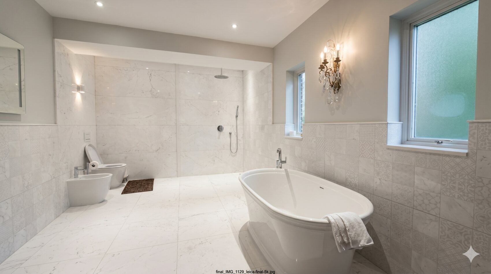 Primary spa bath with freestanding soaking tub and walk-in shower