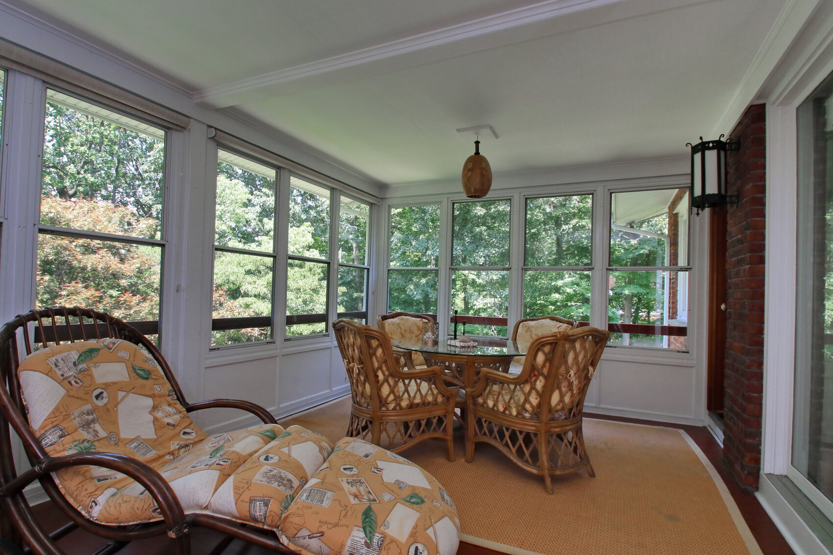 Bi-level covered porch overlooking the woods